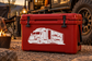 Red vinyl decal featuring a semi truck and trailer on a cargo container