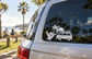 White vinyl decal of shaka hand, palm tree, and camper van on car window