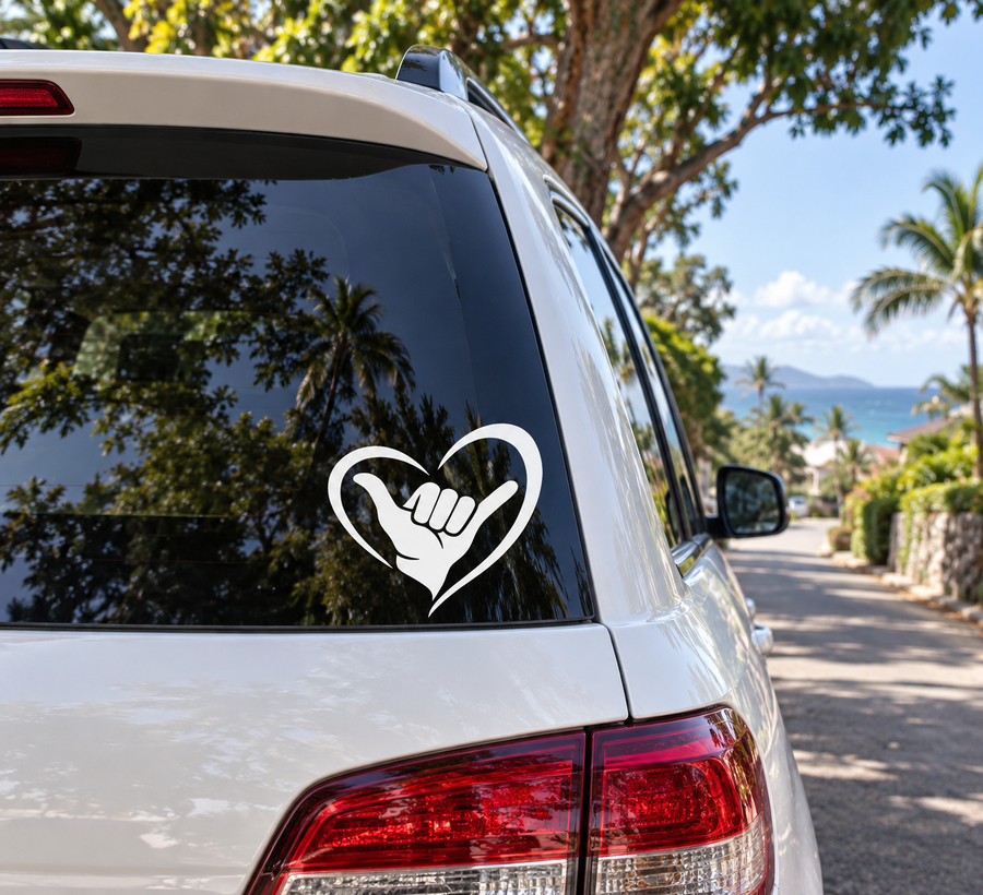 Heart shaka vinyl decal with white heart and shaka hand on car rear window
