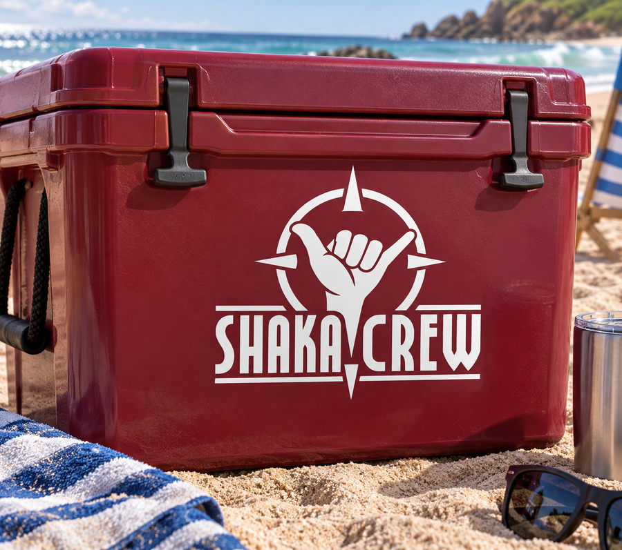 White Shaka Crew vinyl decal logo with hand and arrows on a red cooler