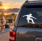 Skateboarding vinyl decal of a low-ollie skater silhouette on a car window