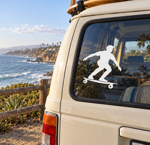 Skateboarding vinyl decal of a white skateboarder silhouette on a car window