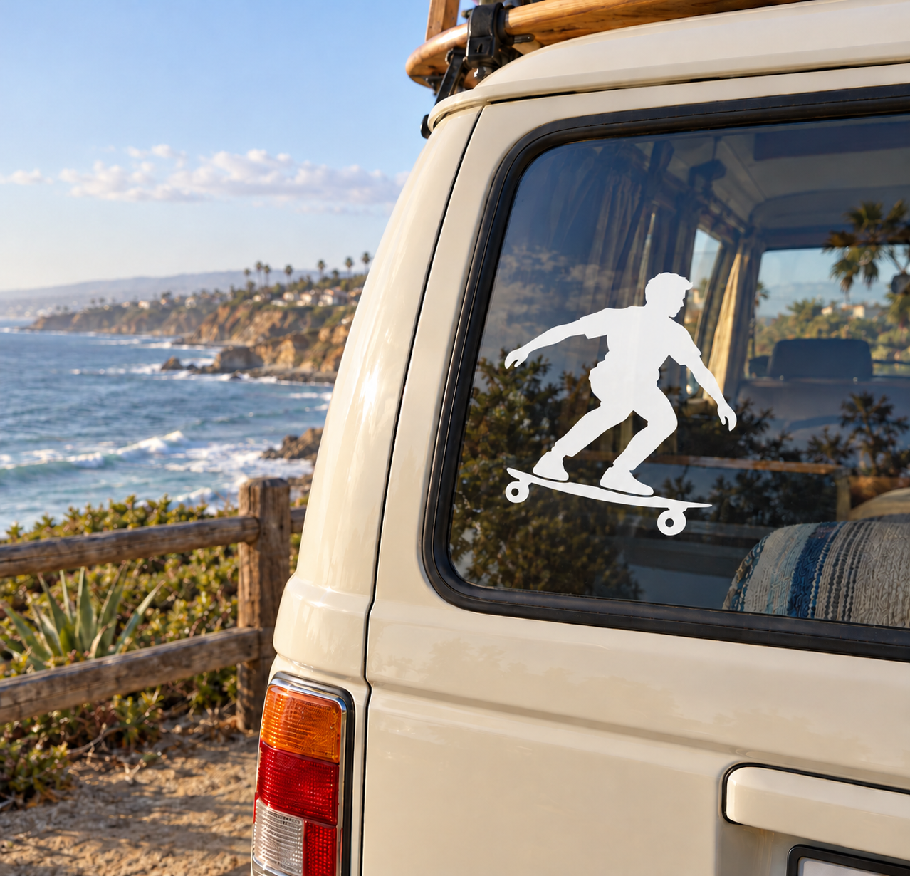 Skateboarding vinyl decal of a white skateboarder silhouette on a car window