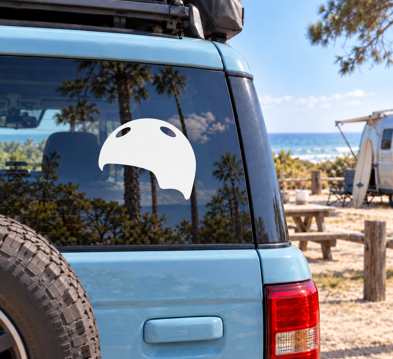 Helmet-shaped vinyl decal, white skate park style on vehicle window