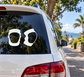 Pair of white vinyl club skate pad decals for a car rear window
