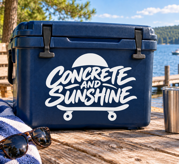 Skateboarding vinyl decal with white 'Concrete and Sunshine' script over cart wheels