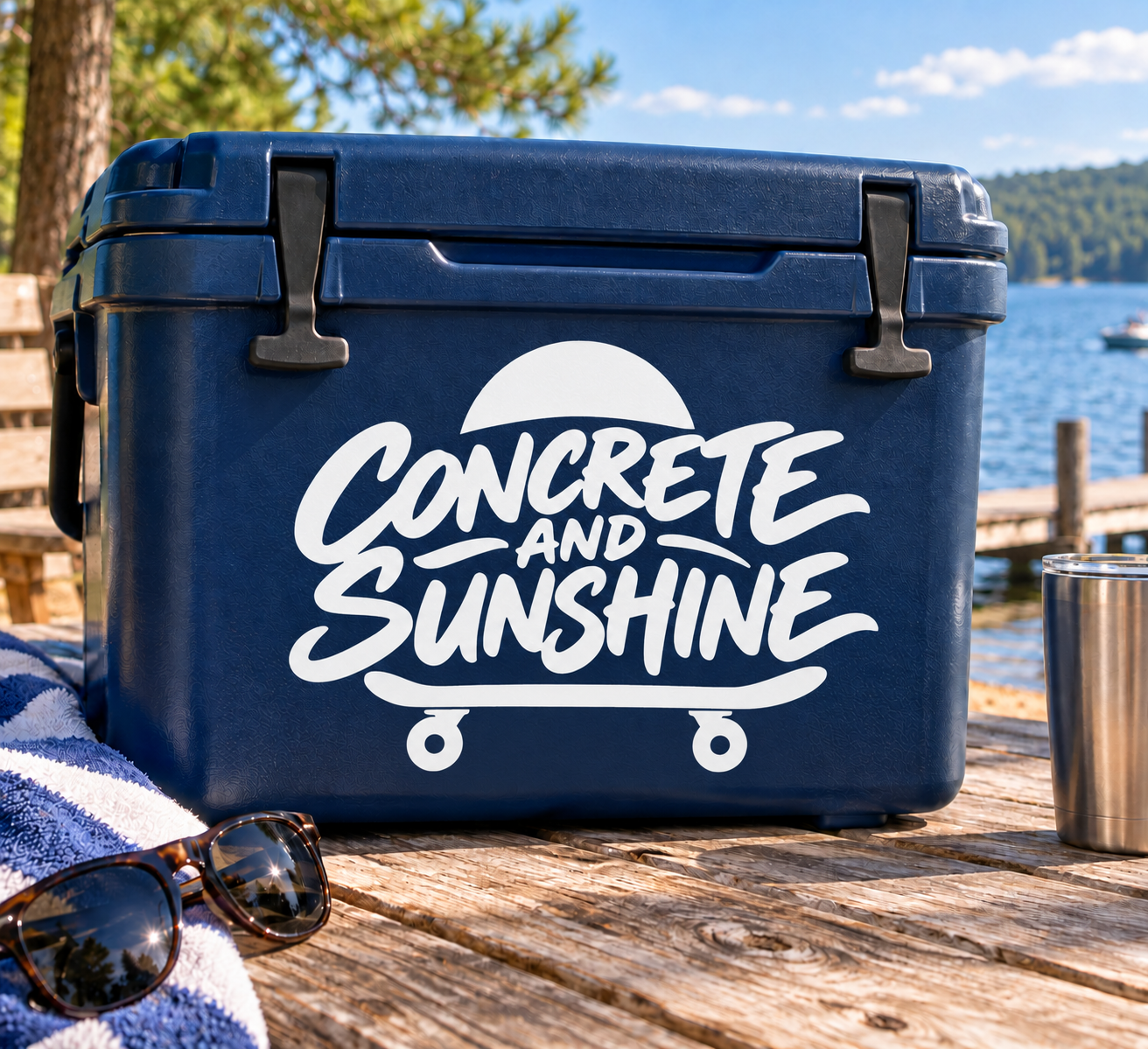 Skateboarding vinyl decal with white 'Concrete and Sunshine' script over cart wheels