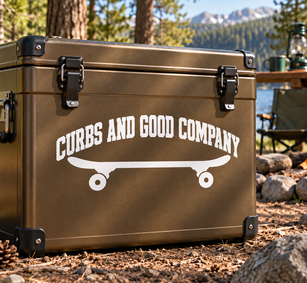 Skateboarding curbs and good company vinyl decal with skateboard graphic, on brown case