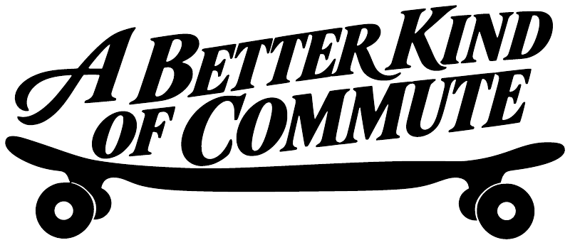 Vinyl decal close-up: black 'A Better Kind of Commute' with skateboard wheels graphic