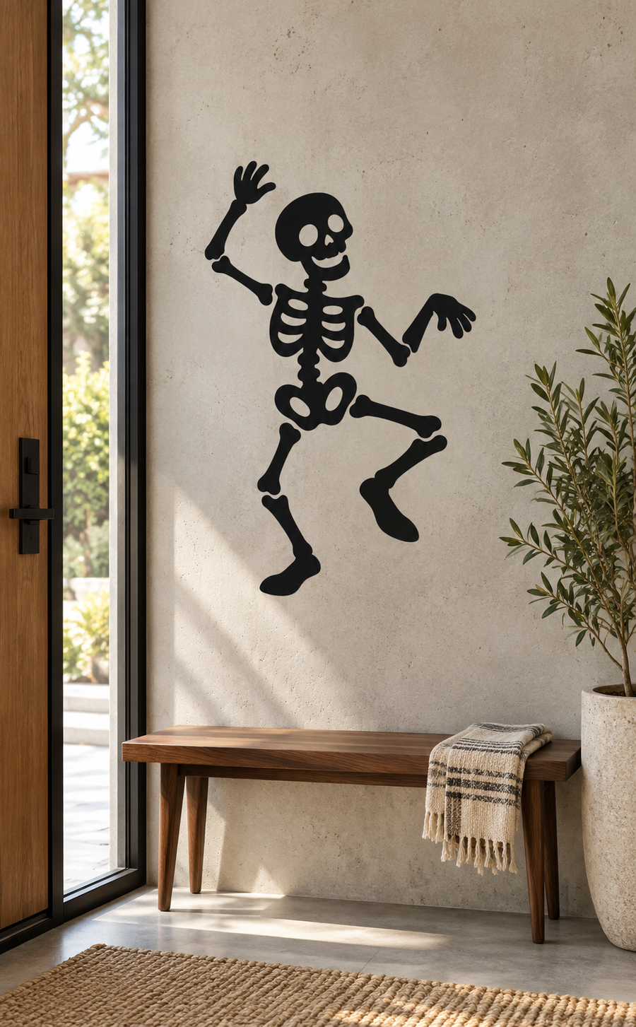 Black dancing skeleton silhouette vinyl decal with arms raised and one leg bent