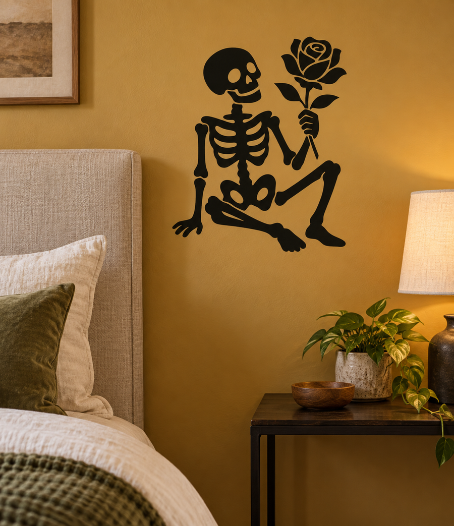 Skeleton holding rose vinyl decal in black, skeletal figure with rose in hand.