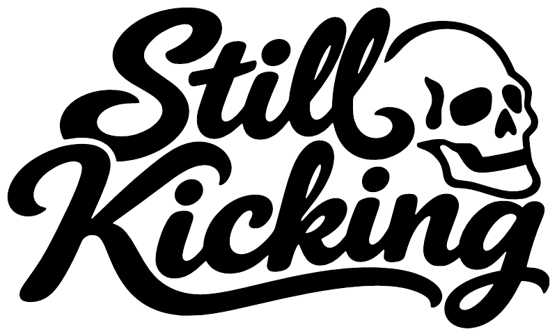 Still Kicking vinyl decal logo with skull outline in black