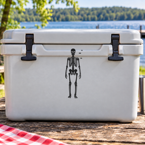 White cooler lid with black skeleton figure decal centered between corner latches