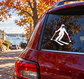 Skiing vinyl decal of white skier silhouette on skis with poles