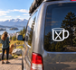 White vinyl decal of a camp mug with an X mark for vehicle windows.