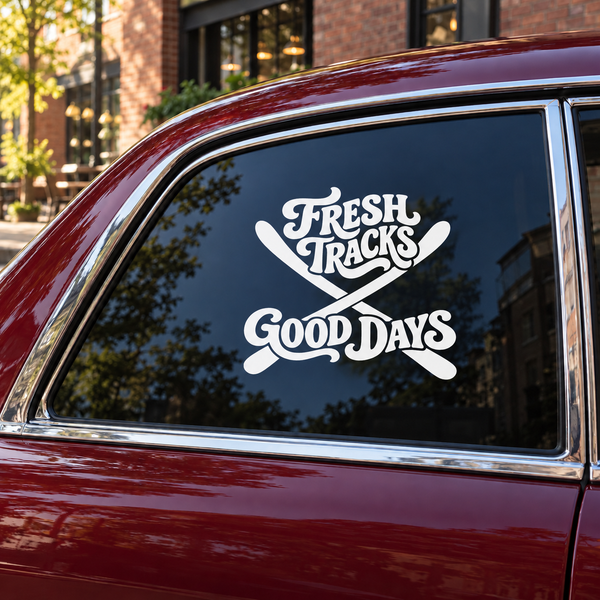 Vinyl decal for car window with “Fresh Tracks” and “Good Days” in white
