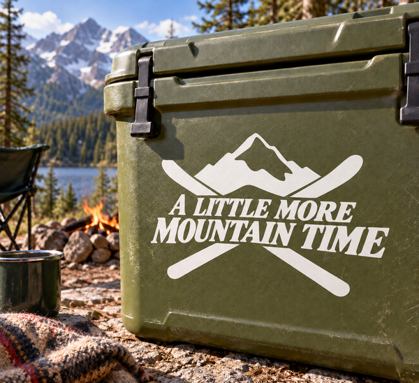 Vinyl decal: crossed ski poles, mountain graphic, and 'A Little More Mountain Time' text