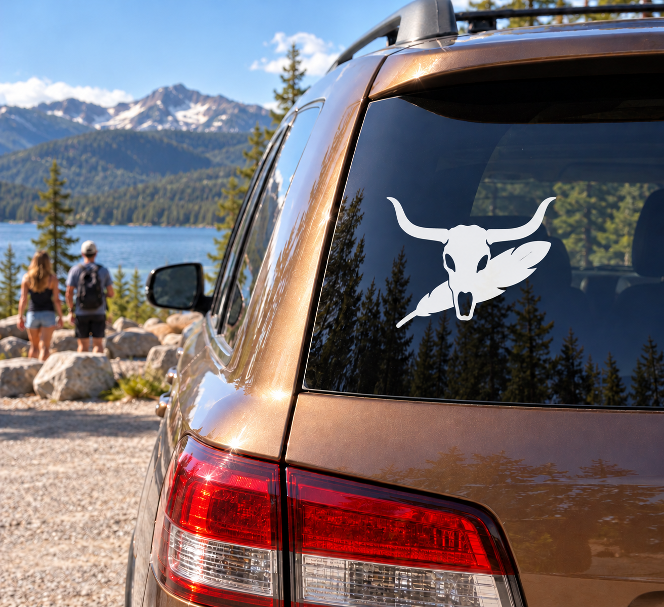 Longhorn feather vinyl decal with white longhorn skull on a car window