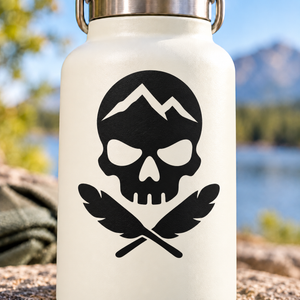 Black skull vinyl decal with mountain peaks, feathered wings and crossed swords