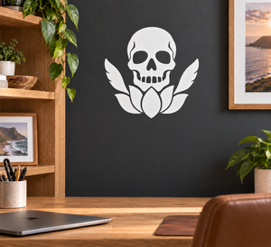 Skull lotus vinyl decal with winged skull and heart-shaped flower center, white and black