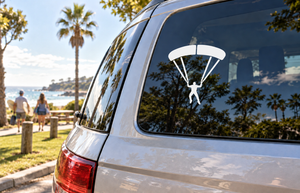 Parachute skydiver vinyl decal: black canopy with diver silhouette on car window