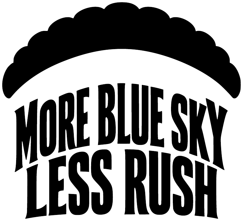 Black cloud-shaped vinyl decal with bold text: MORE BLUE SKY LESS RUSH