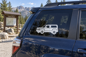 Slate SUV side profile vinyl decal on dark blue vehicle window