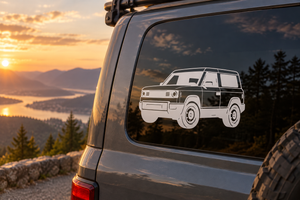 Slate-colored SUV vinyl decal on vehicle rear window, low front angle design.