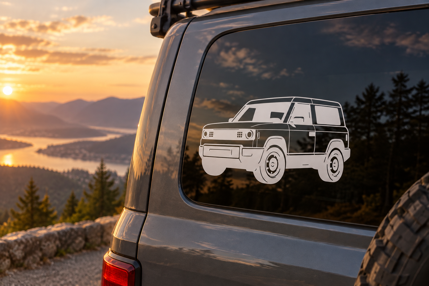 Slate-colored SUV vinyl decal on vehicle rear window, low front angle design.