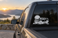 Truck vinyl decal featuring a white off-road concept pickup on a car window