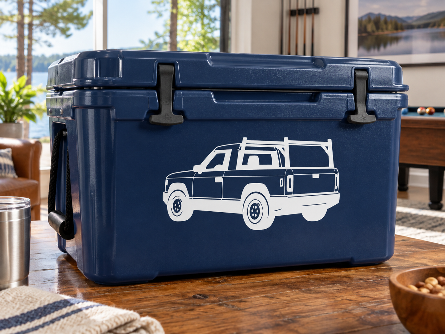 Navy utility cooler with white truck vinyl decal on front