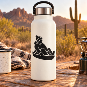 Black sledder vinyl decal on white bottle, rider on sled silhouette