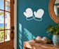 Pair of winter mittens vinyl decal, white outline on a dark background