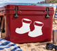 Snow boots vinyl decal: two white boot silhouettes on red