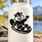 Sledding beaver vinyl decal, black-and-white beaver on a curved sled on a light bottle
