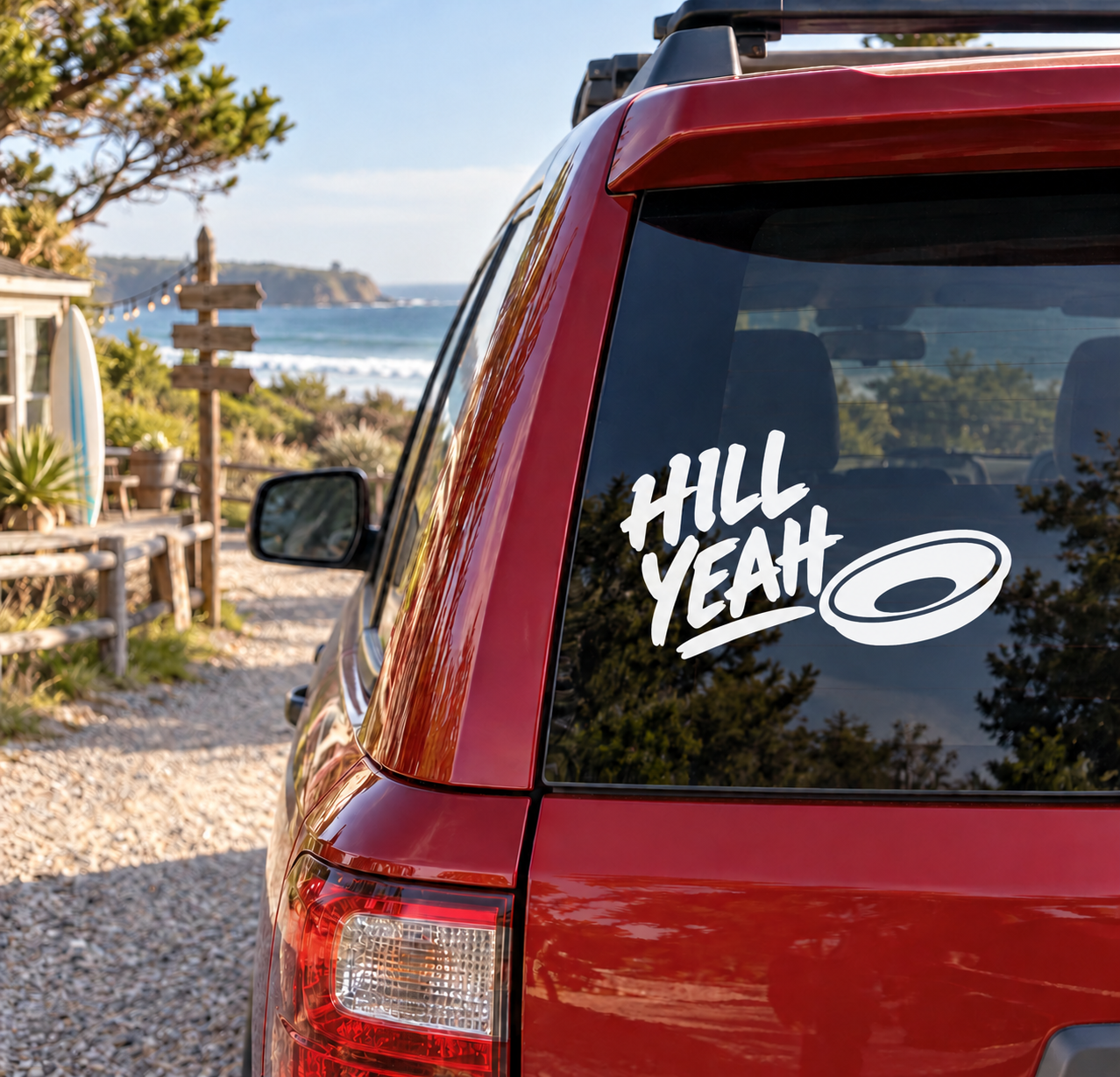 Vinyl decal on car glass: 'Hill Yeah' white lettering with oval logo