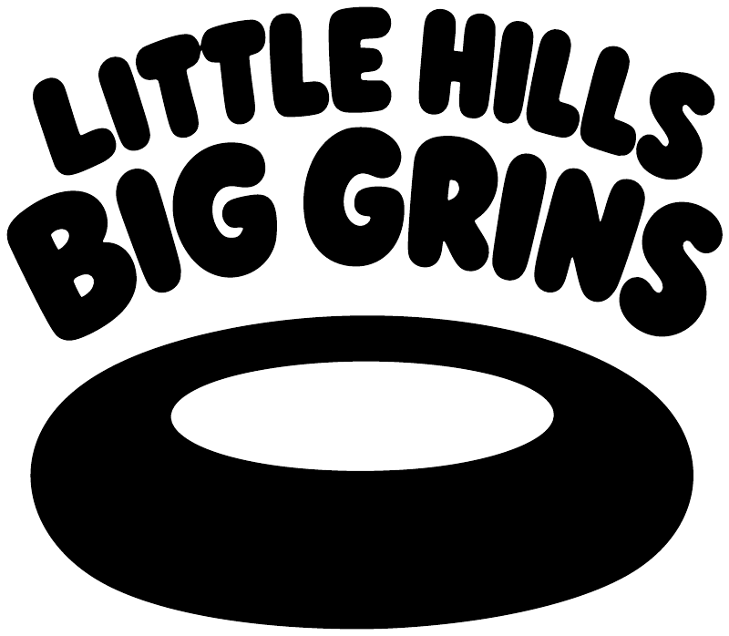 Vinyl decal close-up: 'LITTLE HILLS BIG GRINS' lettering with black oval and center cutout