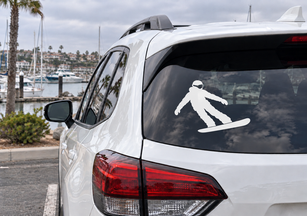 Snowboarding vinyl decal of snowboarder on car rear window