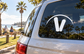 Vinyl arch decal with black snowboard-style V logo on car window