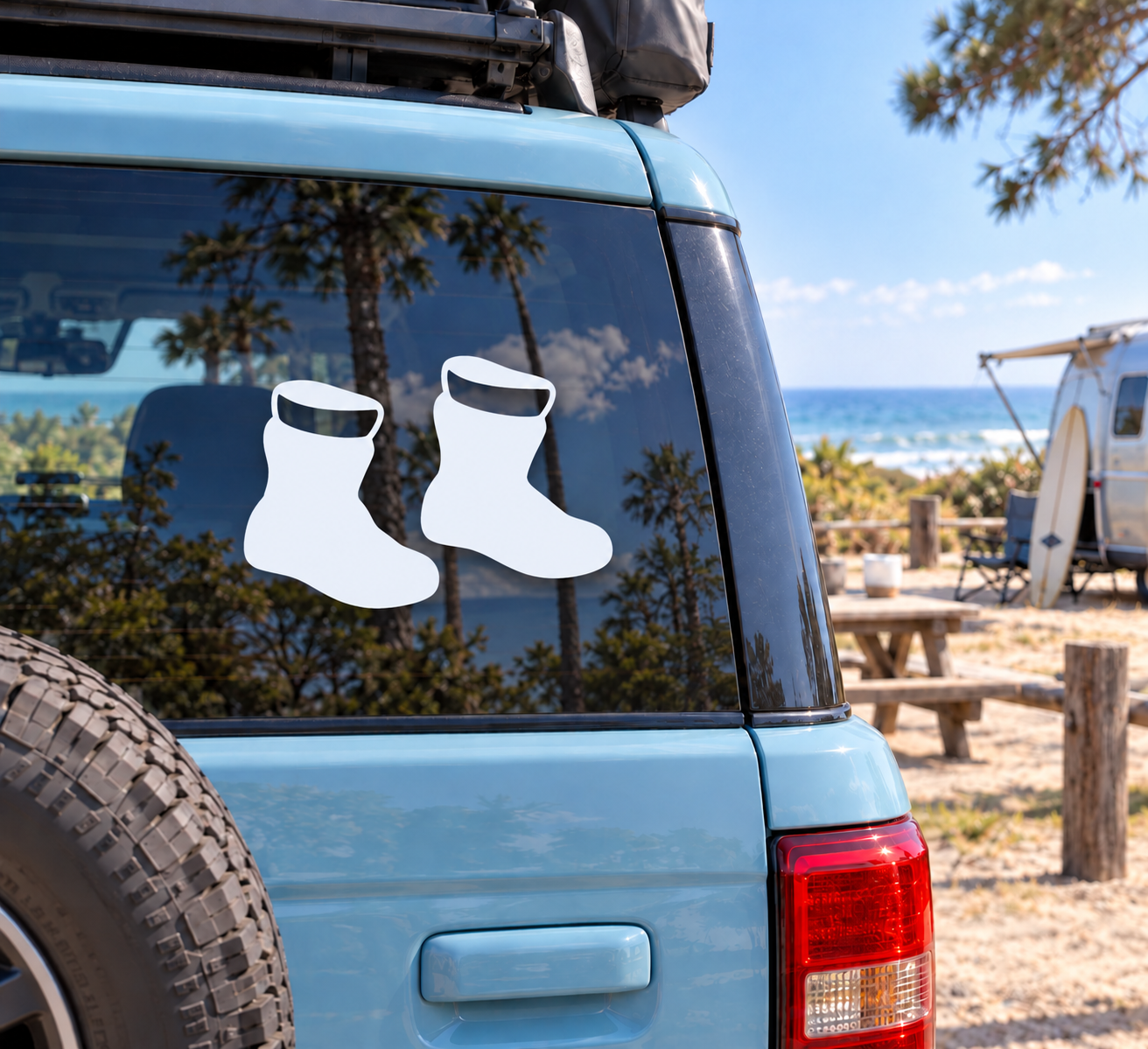 Pair of white snowboarding boot vinyl decals for car window