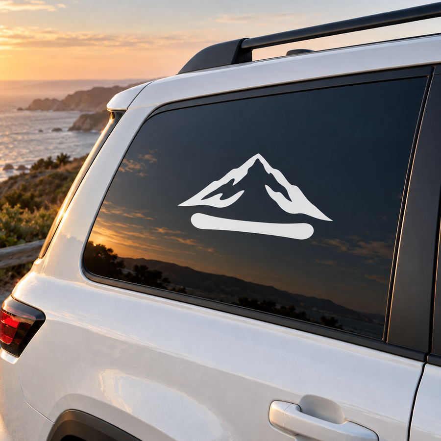Snowboarding mountain lines vinyl decal on car window, white graphic
