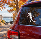 Soccer vinyl decal of a female player kicking a ball on a car rear window