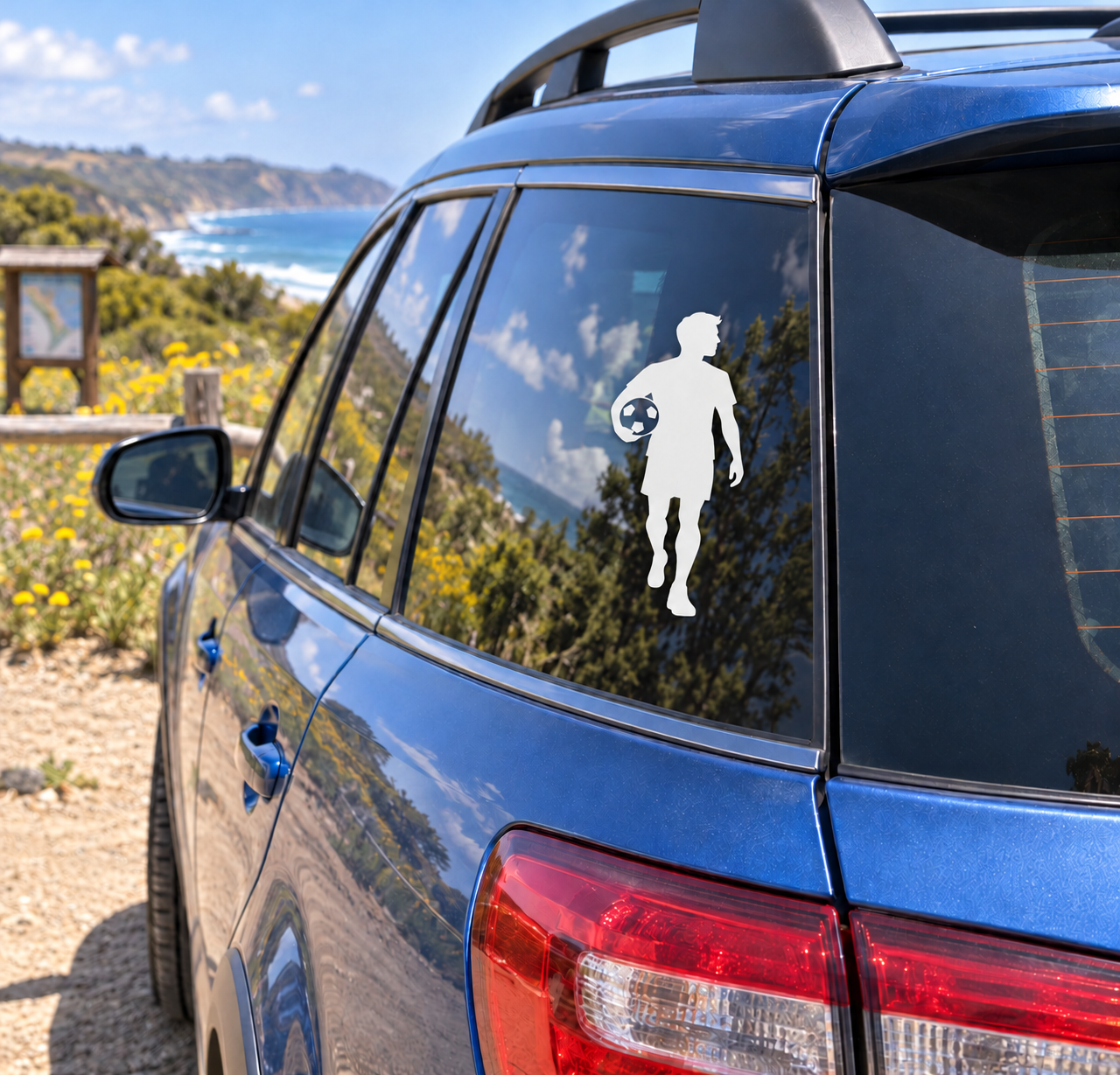 Soccer player vinyl decal with soccer ball silhouette on vehicle window