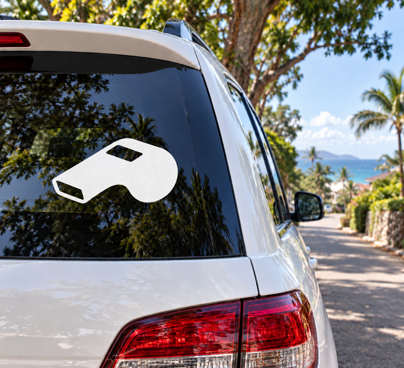 White whistle vinyl decal on car rear window