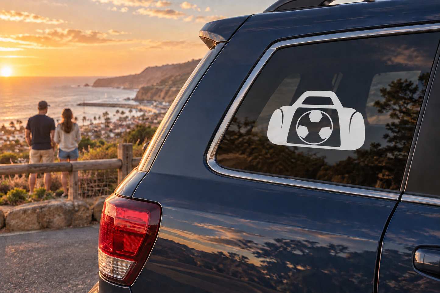 Soccer gear bag vinyl decal on car window: white bag icon with black soccer ball