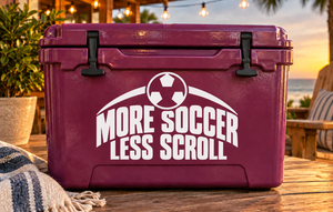 White More Soccer Less Scroll vinyl decal with soccer ball on purple surface