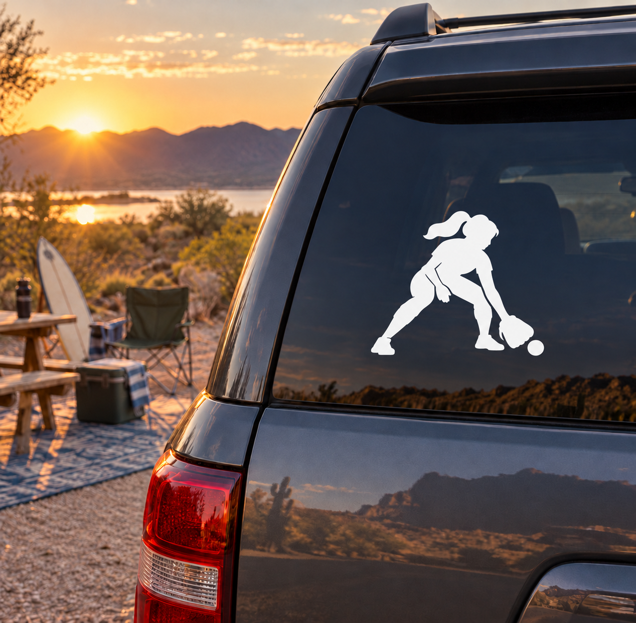 Softball player vinyl decal on car window, white silhouette