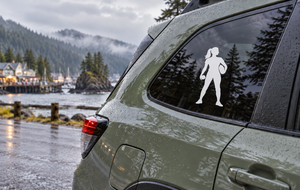 White softball player silhouette vinyl decal for car windows or doors.