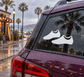 Pair of cleat vinyl decals with two white shoe icons on a car window