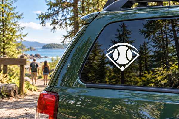 Softball diamond vinyl decal with eye-shaped ball in center on car window